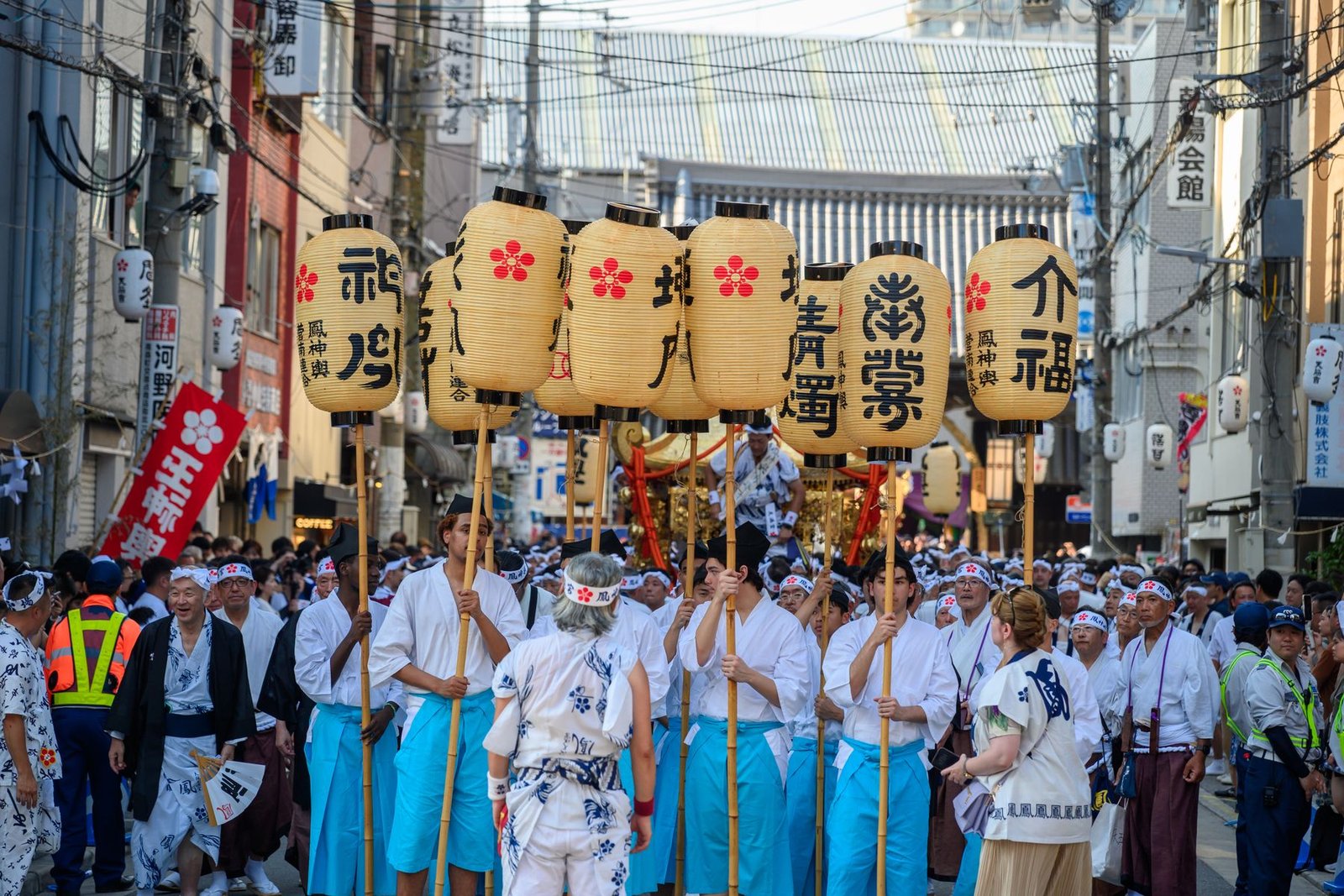 Vibrant Japanese festival parade with lanterns and traditional dress