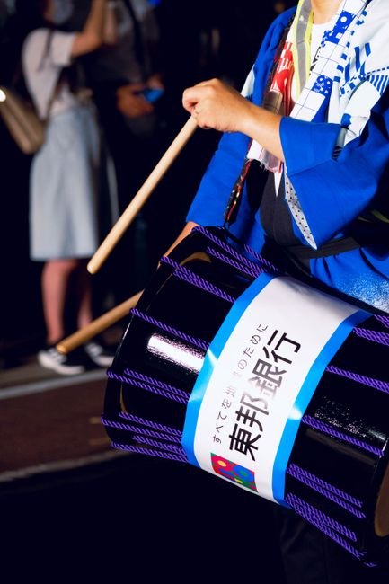 Taiko drummers performing at a Japanese festival