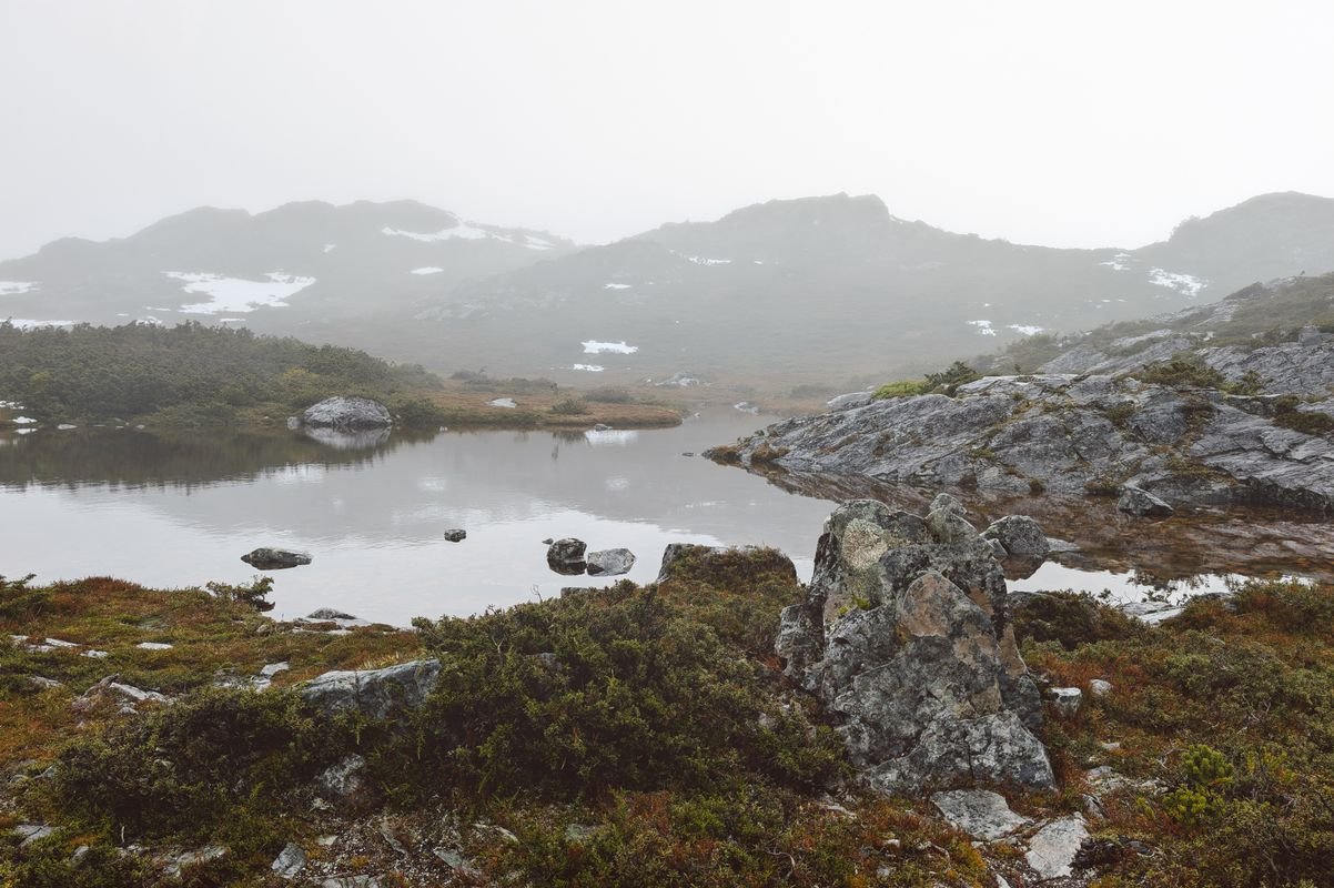 Misty lake mountain landscape