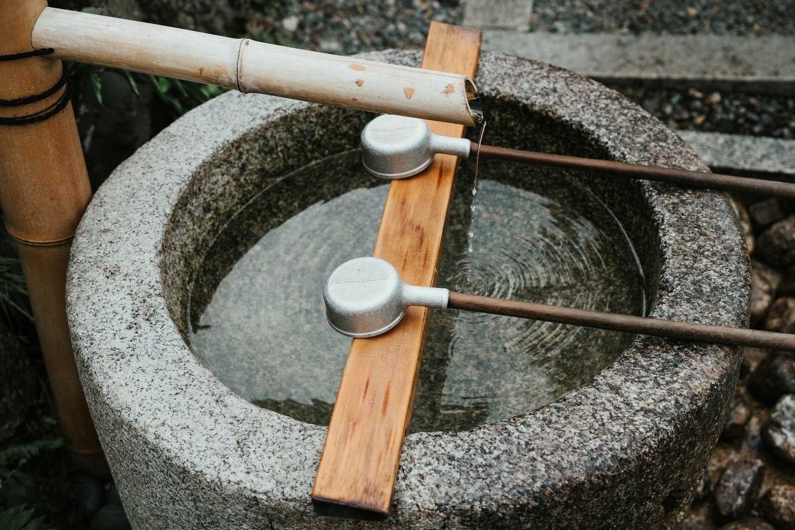 Stone water basin at a Japanese temple, illustrative image