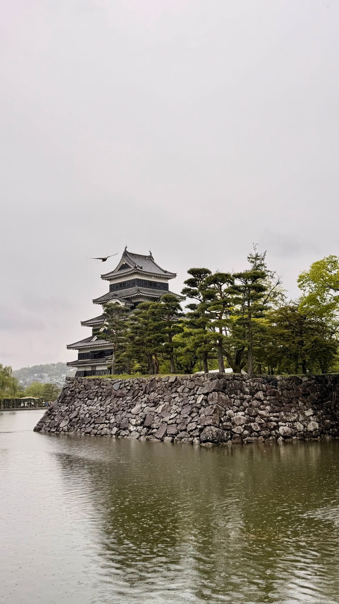 Scenic view of Matsumoto Castle's wooden tower against the sky