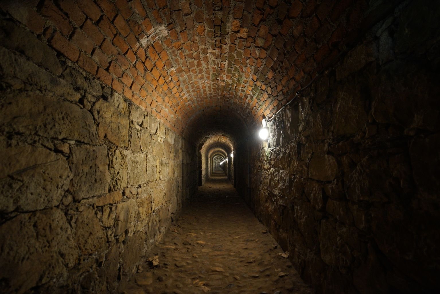 Dark stone tunnel passage