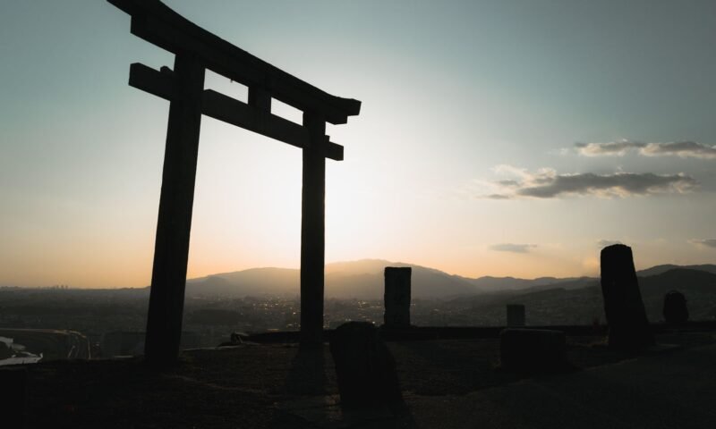 Torii gate at a Japanese Shinto shrine, illustrative stock photo