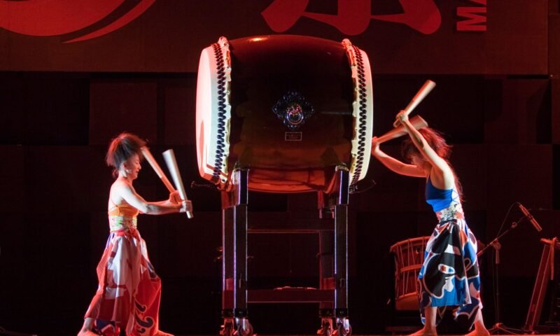 Taiko drummers performing on stage, similar in spirit to the Morioka Sansa Odori