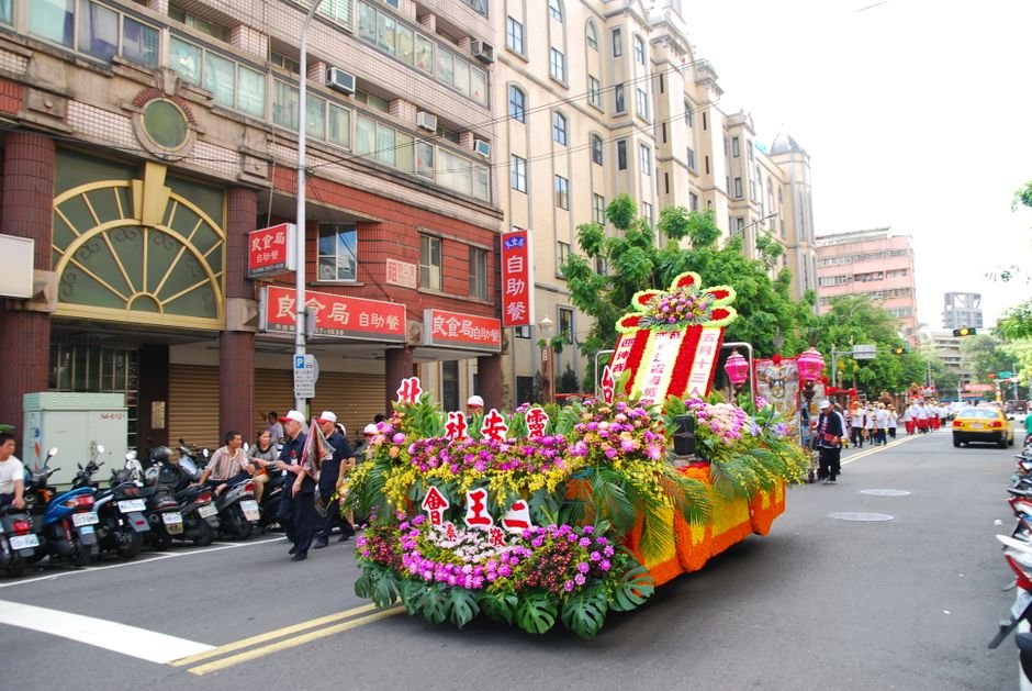 Flower-decorated float at a Japanese festival