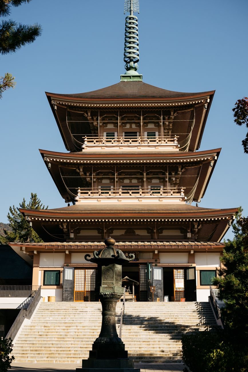 Traditional multi-story wooden temple building in Nagano, Japan