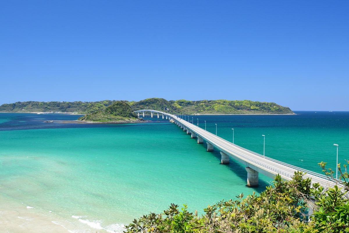 Scenic view of Tsunoshima Bridge spanning turquoise waters in Yamaguchi, Japan