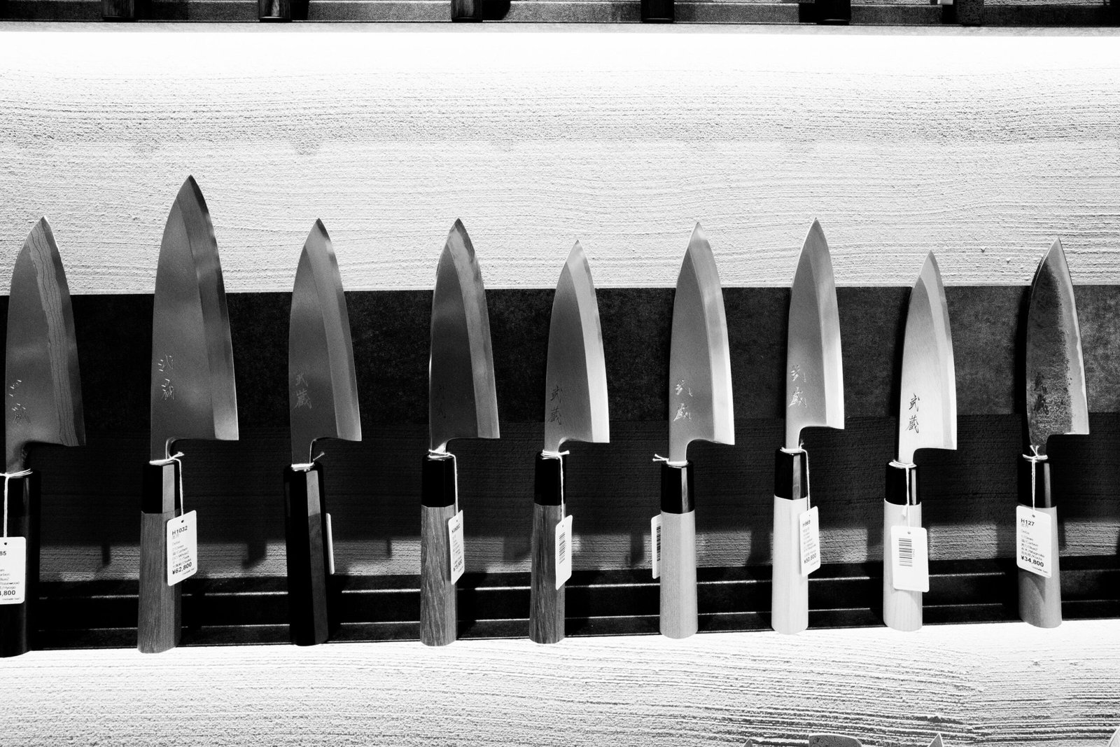 A display of Japanese chef's knives of the kind sold on Kappabashi-dori