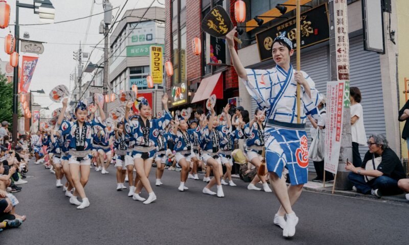 Dancers in colorful costumes performing at the Yosakoi Matsuri street dance festival in Japan